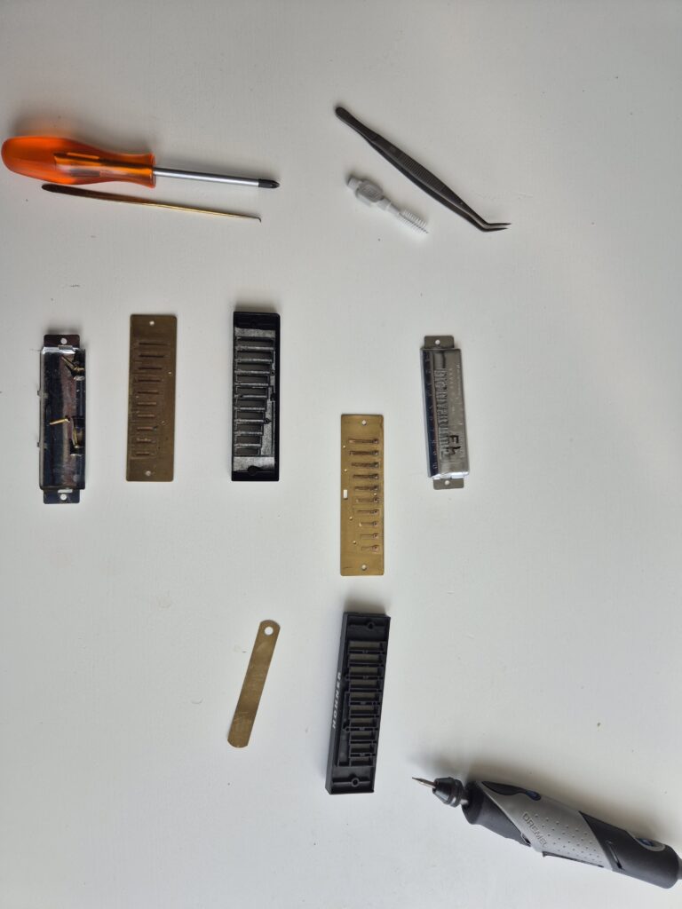 Upper reed plate and comb turned upside down